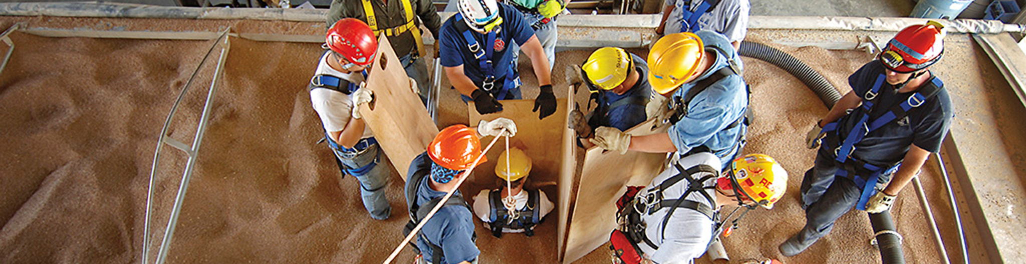 group of people practicing a grain bin rescue
